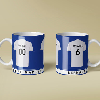 Two mugs with soccer jersey designs on a beige background