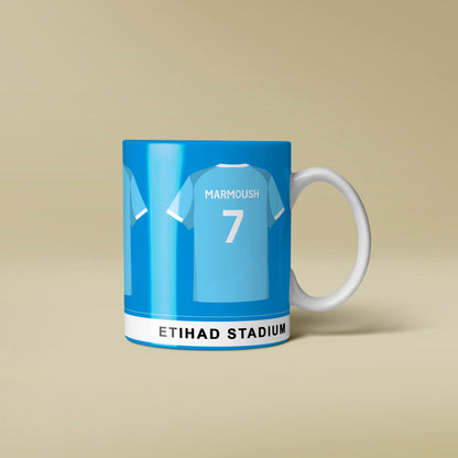 Mug with sports jersey design featuring 'Etihad Stadium' on a beige background