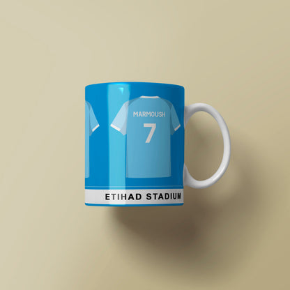 Mug with a design of a blue sports jersey on a beige background