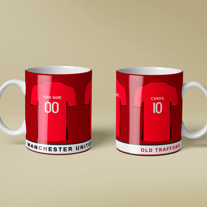 Two red mugs with Man United design on a beige background