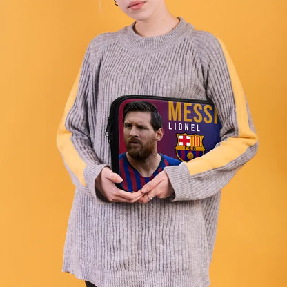 Person holding a pouch with Lionel Messi design against a yellow background