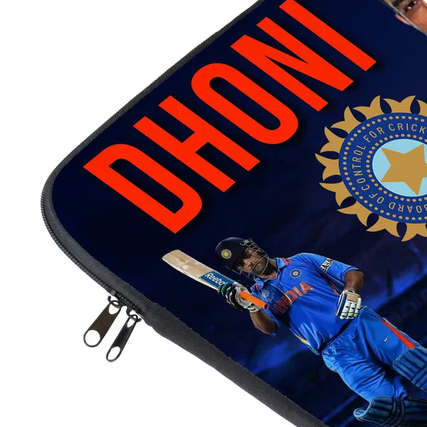Laptop sleeve with a cricket player and 'Dhoni' text on a dark blue background