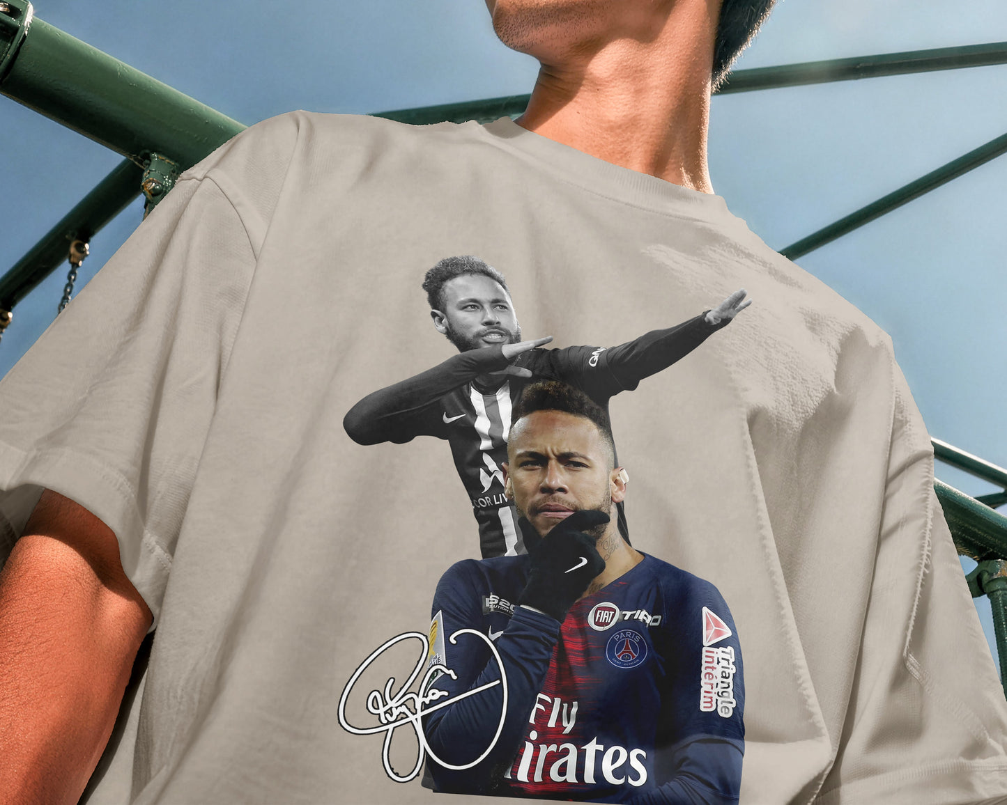 Person wearing a t-shirt with a graphic of a sports player and text.