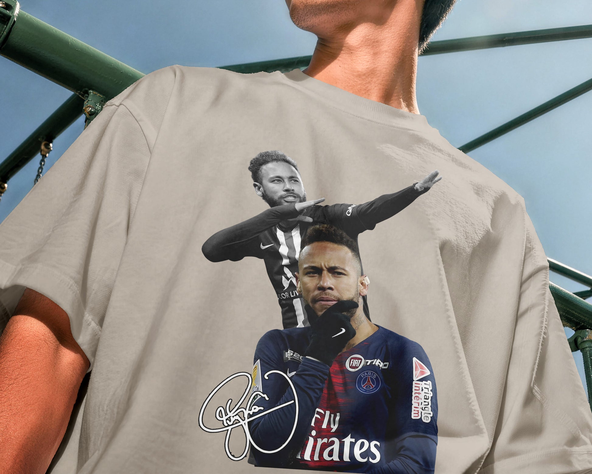 Person wearing a t-shirt with a graphic of a sports player and text.