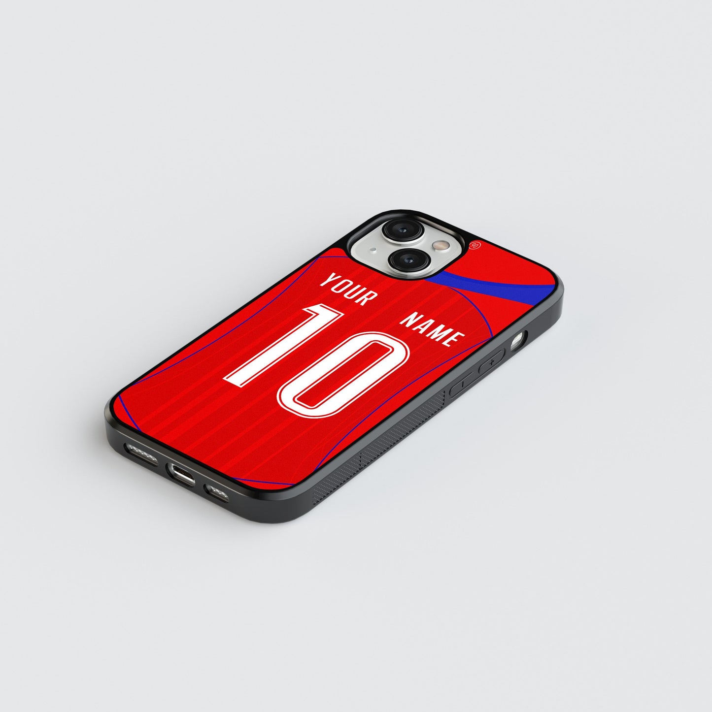 Phone case with red background and white text area for personalization on a light gray background