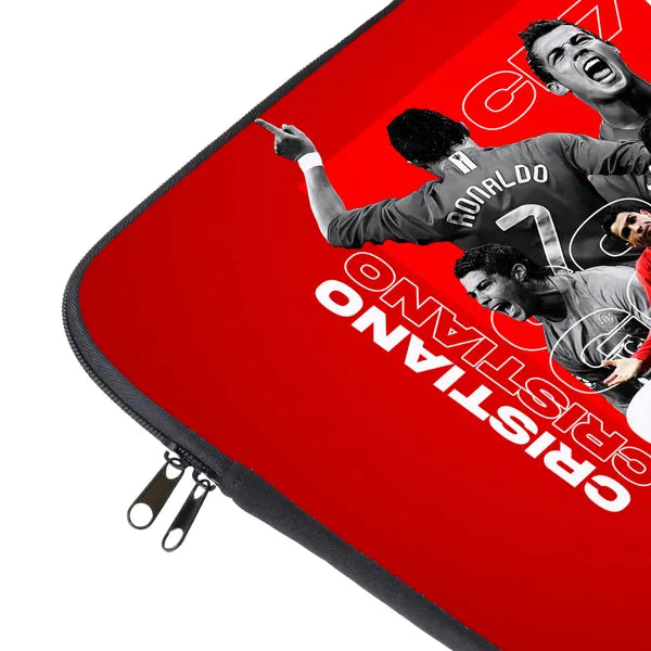 Red laptop sleeve with images of soccer players and names on a white background