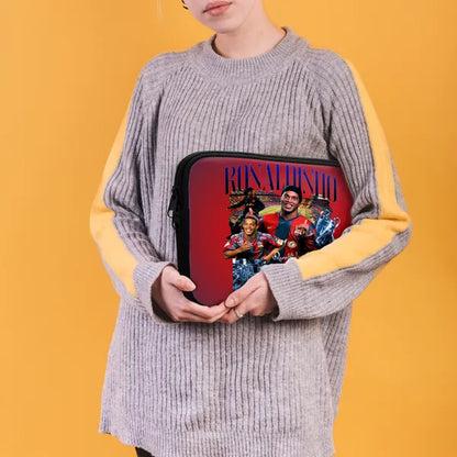 Person holding a red pouch with images and text on a yellow background