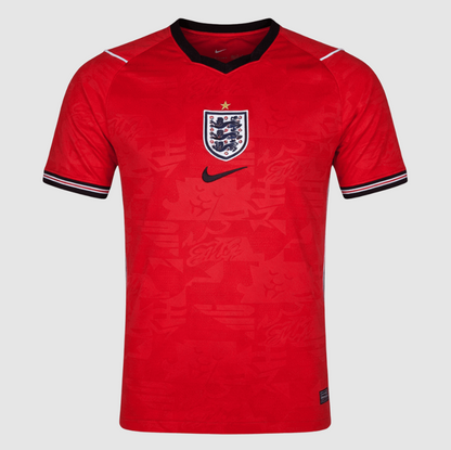 Red sports jersey with Nike logo on a gray background