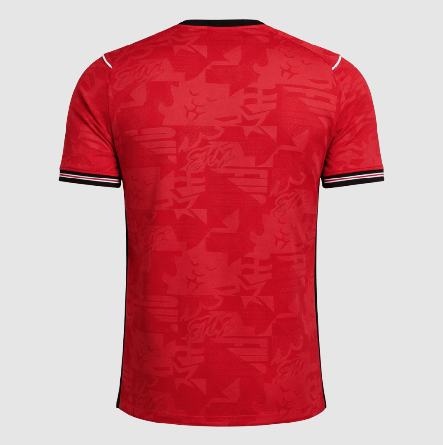 Red sports jersey with a subtle pattern on a gray background