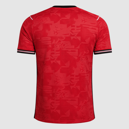 Red sports jersey with a subtle pattern on a gray background