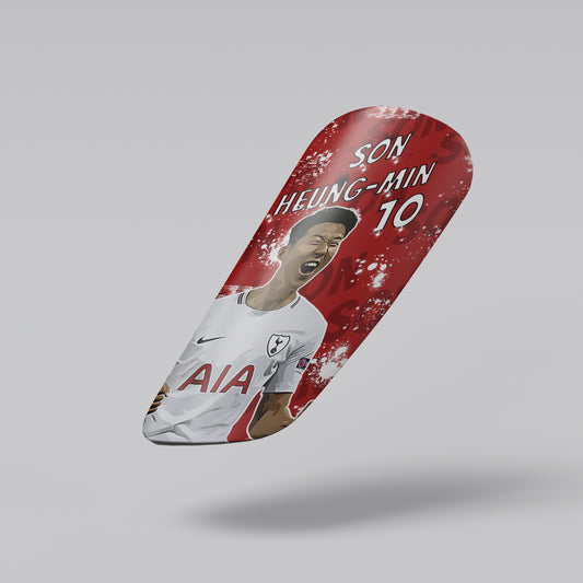 Skateboard deck with a soccer player's face and 'Tottenham' branding on a gray background