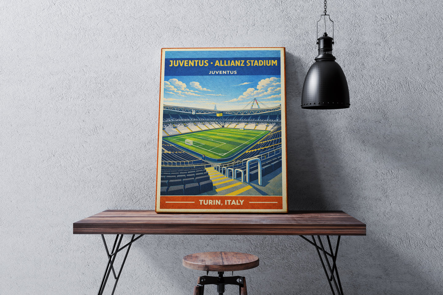 Poster of Juventus Allianz Stadium on a wooden table against a gray wall.