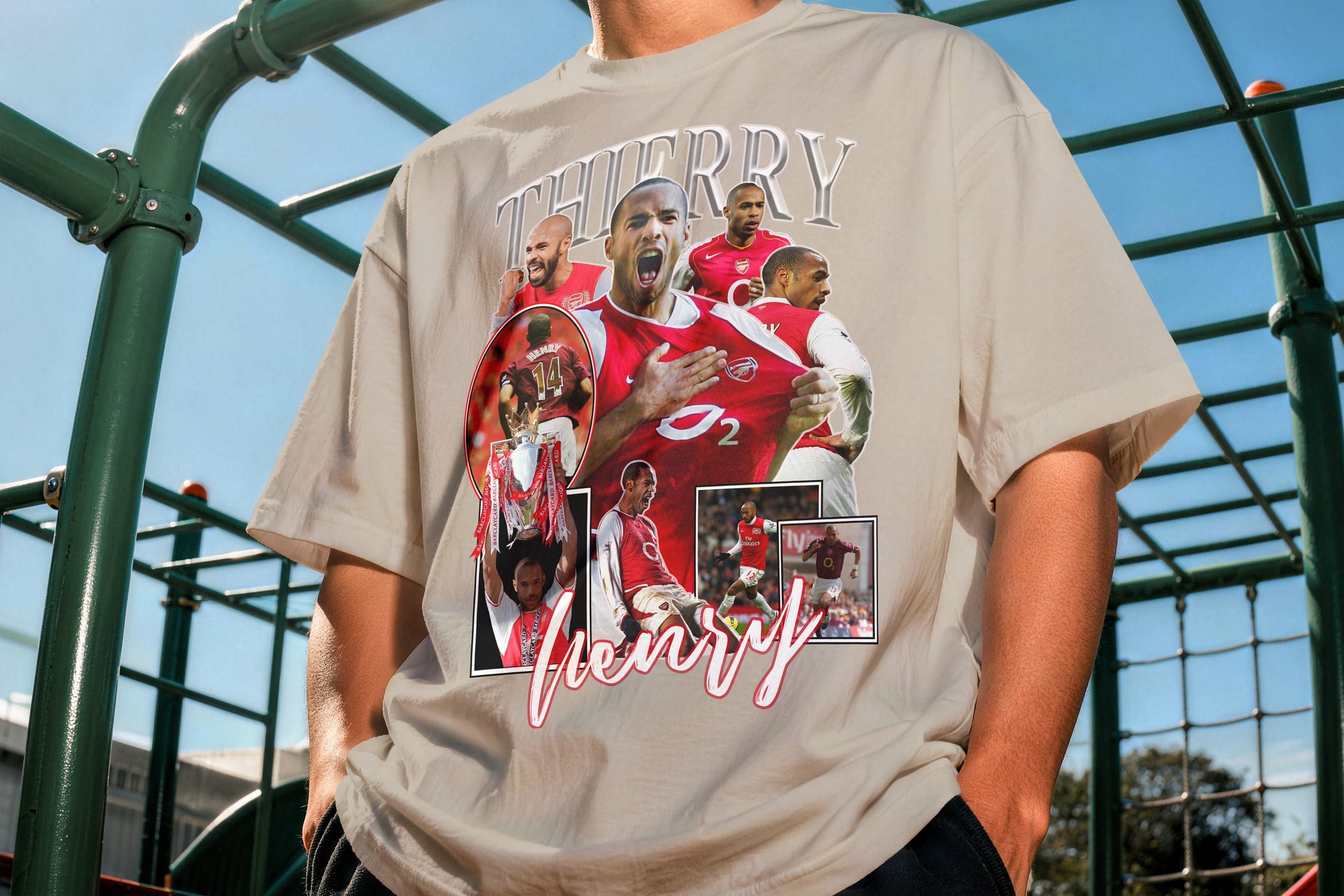 Person wearing a t-shirt with a graphic design and text outdoors