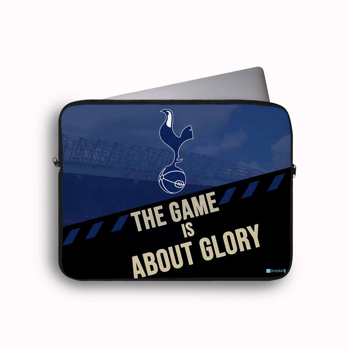 Laptop sleeve with Tottenham Hotspur logo and 'The Game is About Glory' text on a blue and black background.
