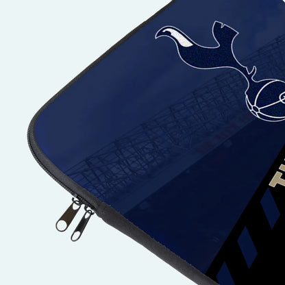 Blue pouch with a white design on a light gray background