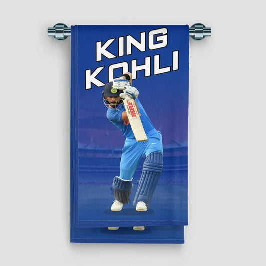 Bowler with bat and helmet on a blue banner with 'King Kohli' text