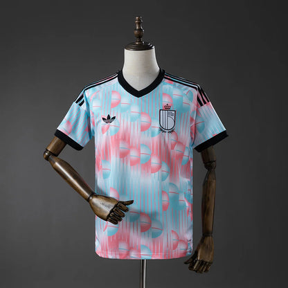 Colorful sports jersey on a mannequin against a gray background