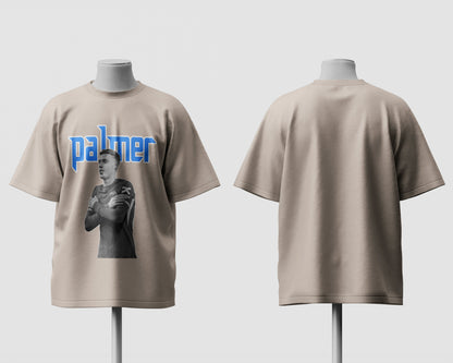 Beige t-shirt with graphic design and 'palmer' text on a mannequin against a white background