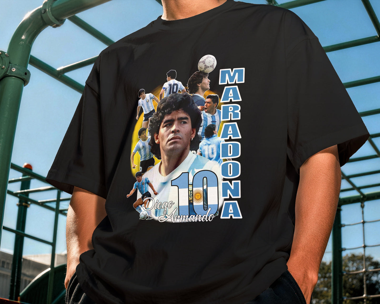 Person wearing a black t-shirt with a graphic of a famous soccer player and the number 10.