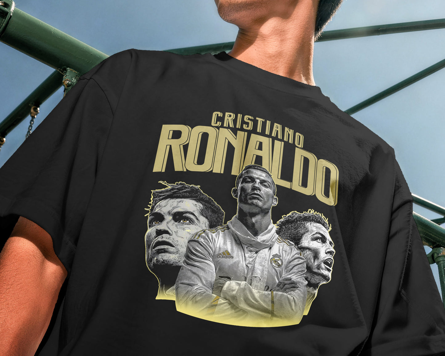Person wearing a black t-shirt with a graphic of Cristiano Ronaldo and text.