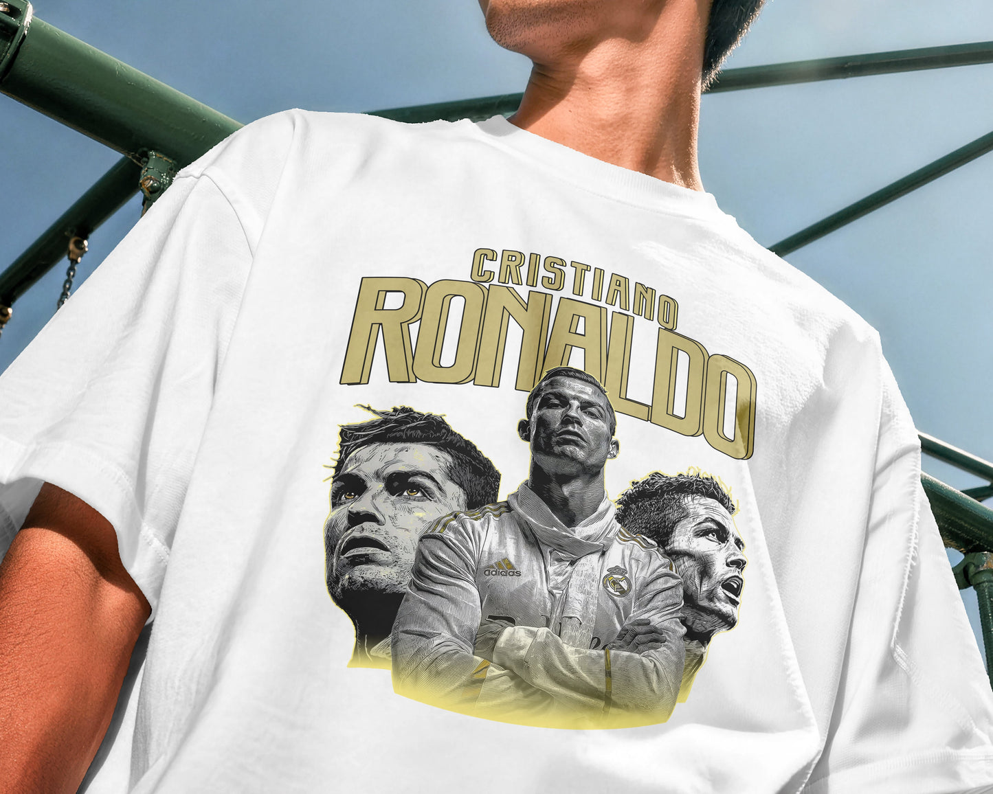 Person wearing a white t-shirt with a graphic of Cristiano Ronaldo and text.