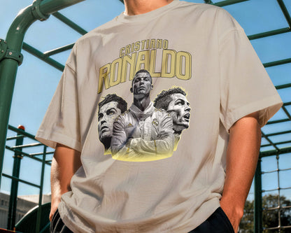 Person wearing a t-shirt with a graphic of Cristiano Ronaldo and text outdoors.