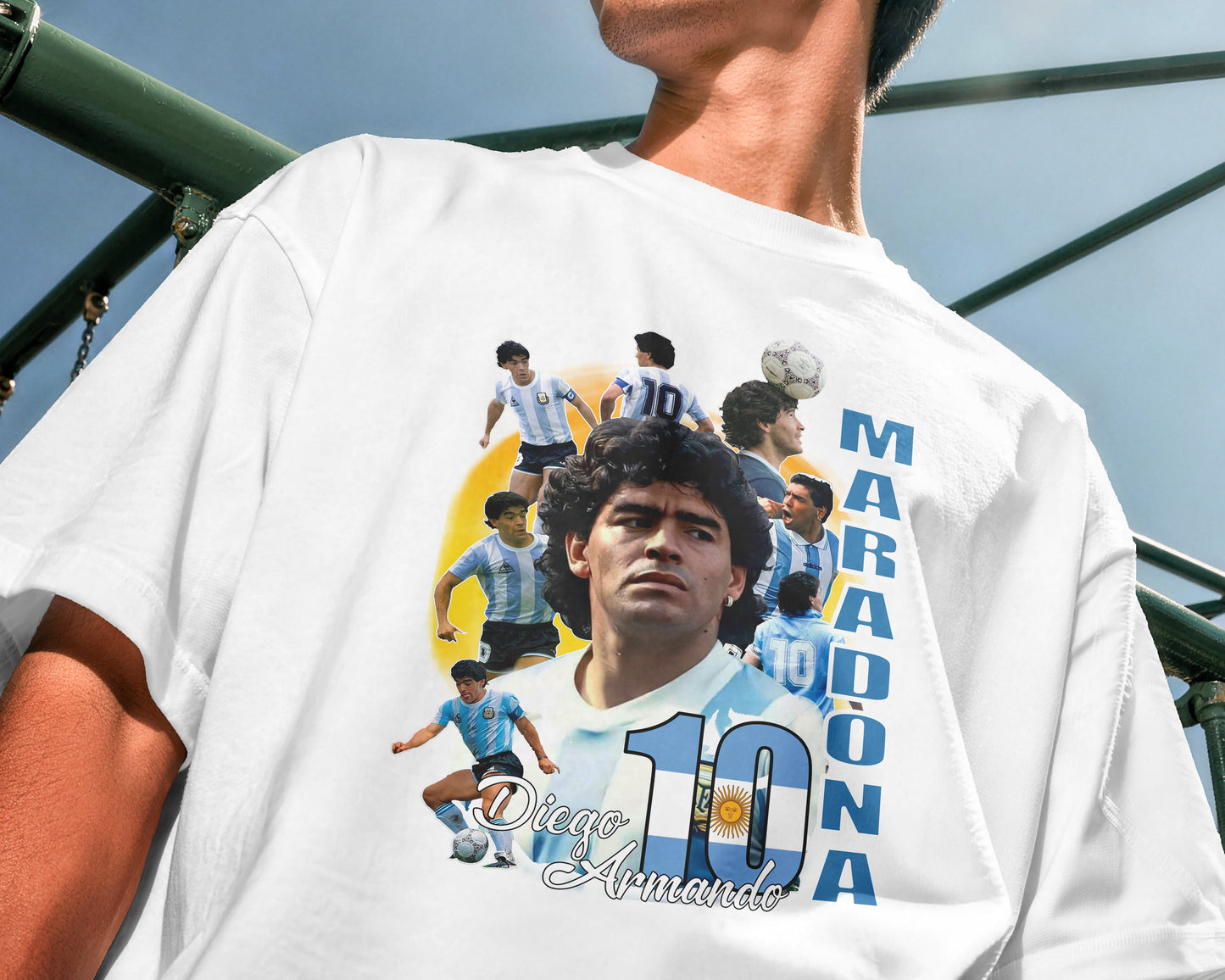 Person wearing a white t-shirt with Diego Maradona graphics and text.