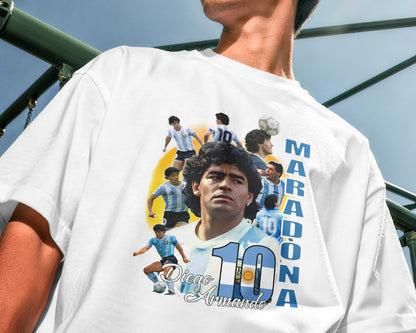 Person wearing a white t-shirt with Diego Maradona graphics and text.