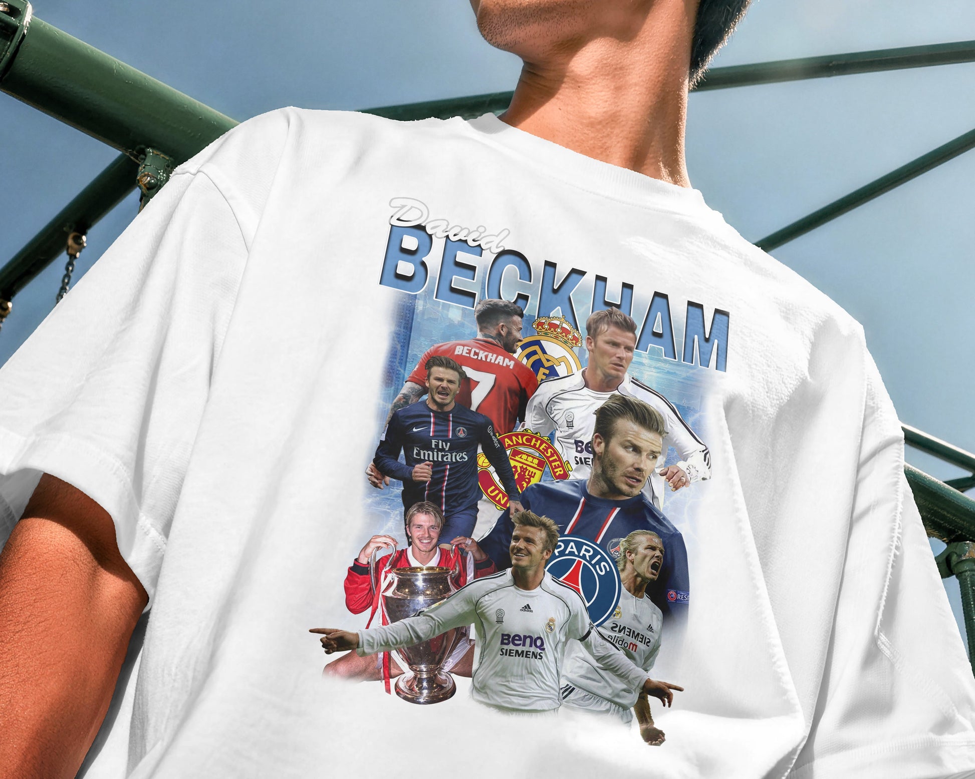 Person wearing a white t-shirt with football player graphics and 'BECKHAM' text.
