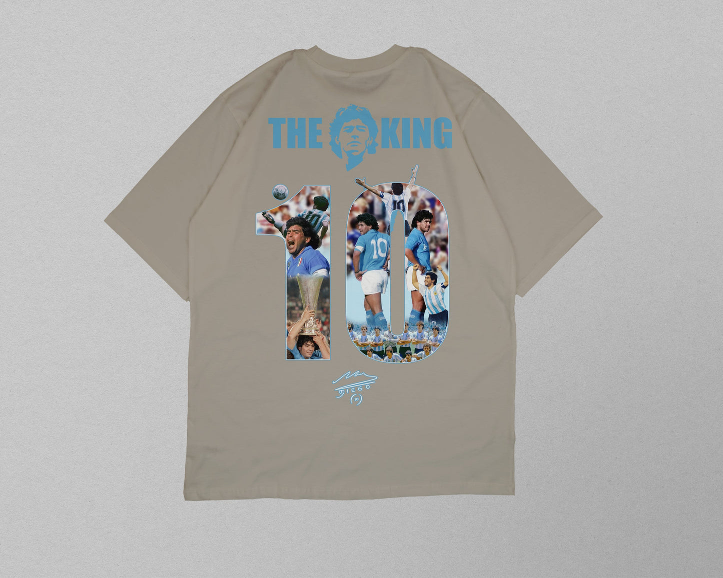 Beige t-shirt with graphic design and text on a light gray background