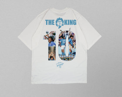 White t-shirt with graphic design and text on a gray background