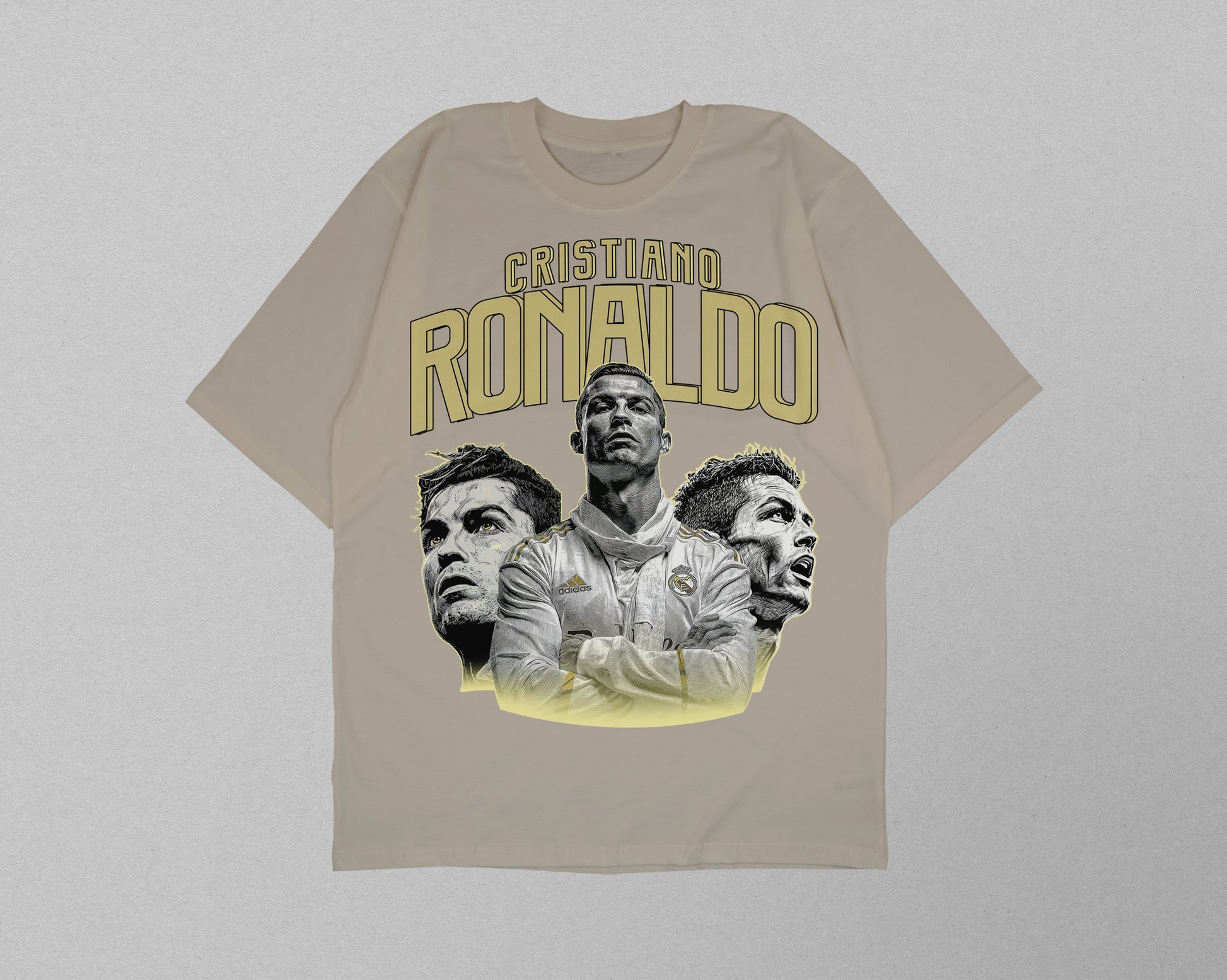 Beige t-shirt with images of a person and 'Cristiano Ronaldo' text on a light gray background