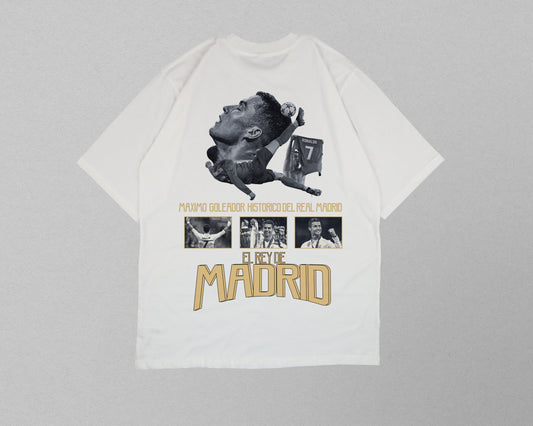 White t-shirt with graphic design on a gray background