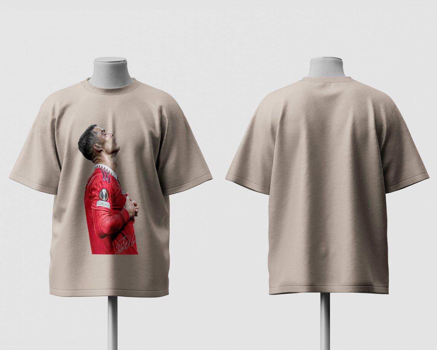 Beige t-shirt with a graphic of a person in a red jacket on a white background