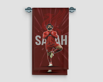 Towel with a soccer player in red uniform on a red background, featuring the name 'Saray'.